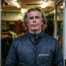 Pete Jones standing outside PJ Surf Shop, Gower