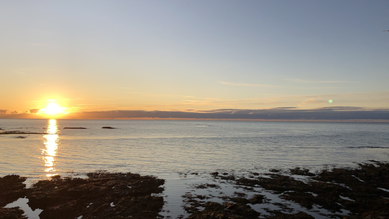View of Aberystwyth sea front at sunset.