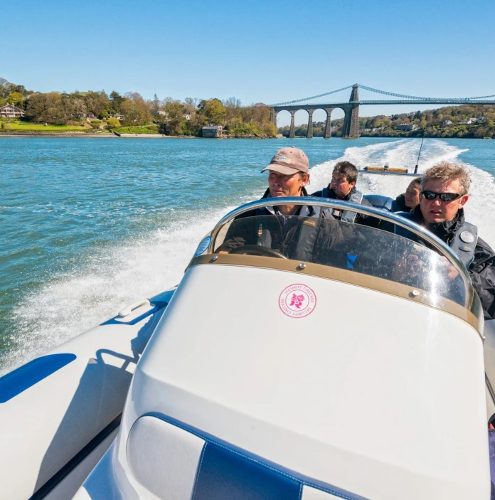 People on a rib boat ride on the Menai Strait