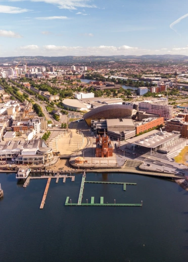 An aerial view of all the attractions and waterfront at Cardiff Bay.