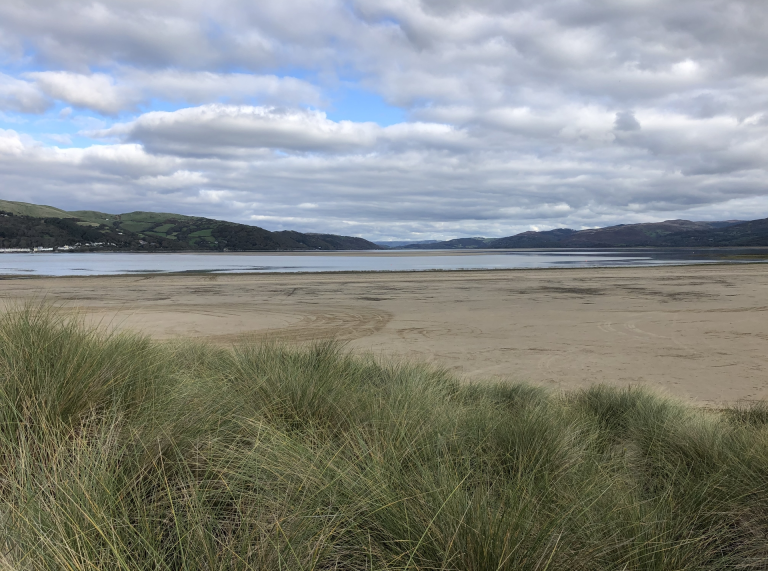 Ynyslas Nature Reserve, the Afon Leri and the mountainous scenery