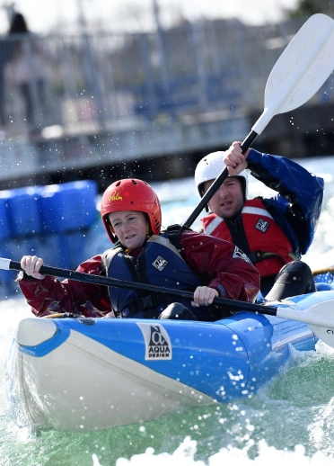 two people white water rafting at Cardiff International White Water.