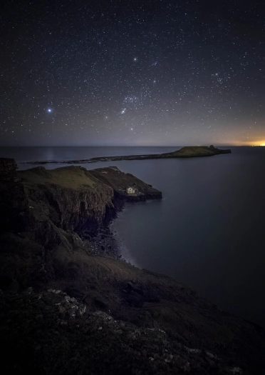 dark skies above Worm's Head.
